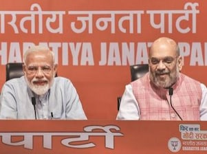 Prime Minister Narendra Modi (left) with Union Home Minister Amit Shah (right).